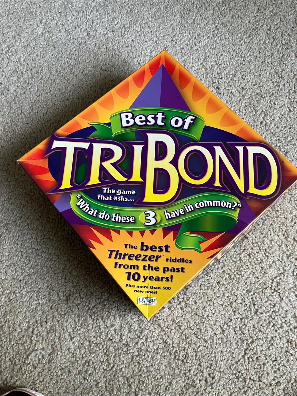 Best of TriBond Party Game - Bright Purple & Yellow Box
